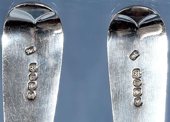 A pair of William IV silver fiddle pattern serving spoons and a similar Victorian pair, Length 237mm, weight 4.9oz/153grms